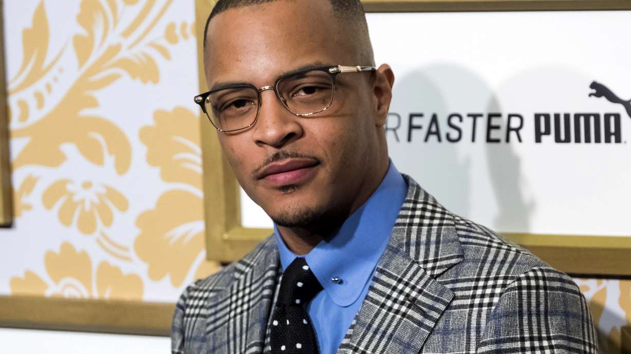 The Latest: Rapper T.I. arrested outside his gated community