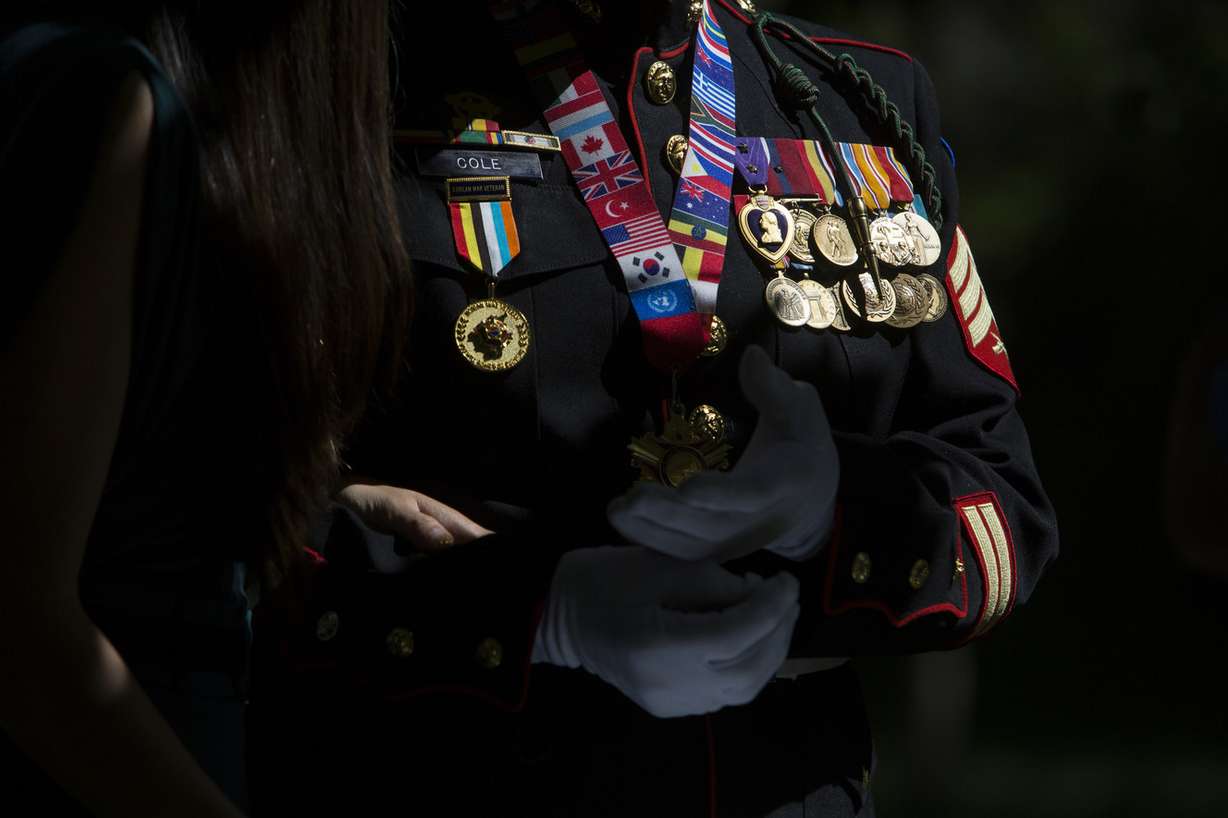 The medals worn by World War II and Korean War Marine veteran John Cole, of Roy, as he talks about his experiences before a Korean War memorial ceremony at Memory Grove Park in Salt Lake City on Wednesday, May 16, 2018. (Photo: Jacob Wiegand, KSL)