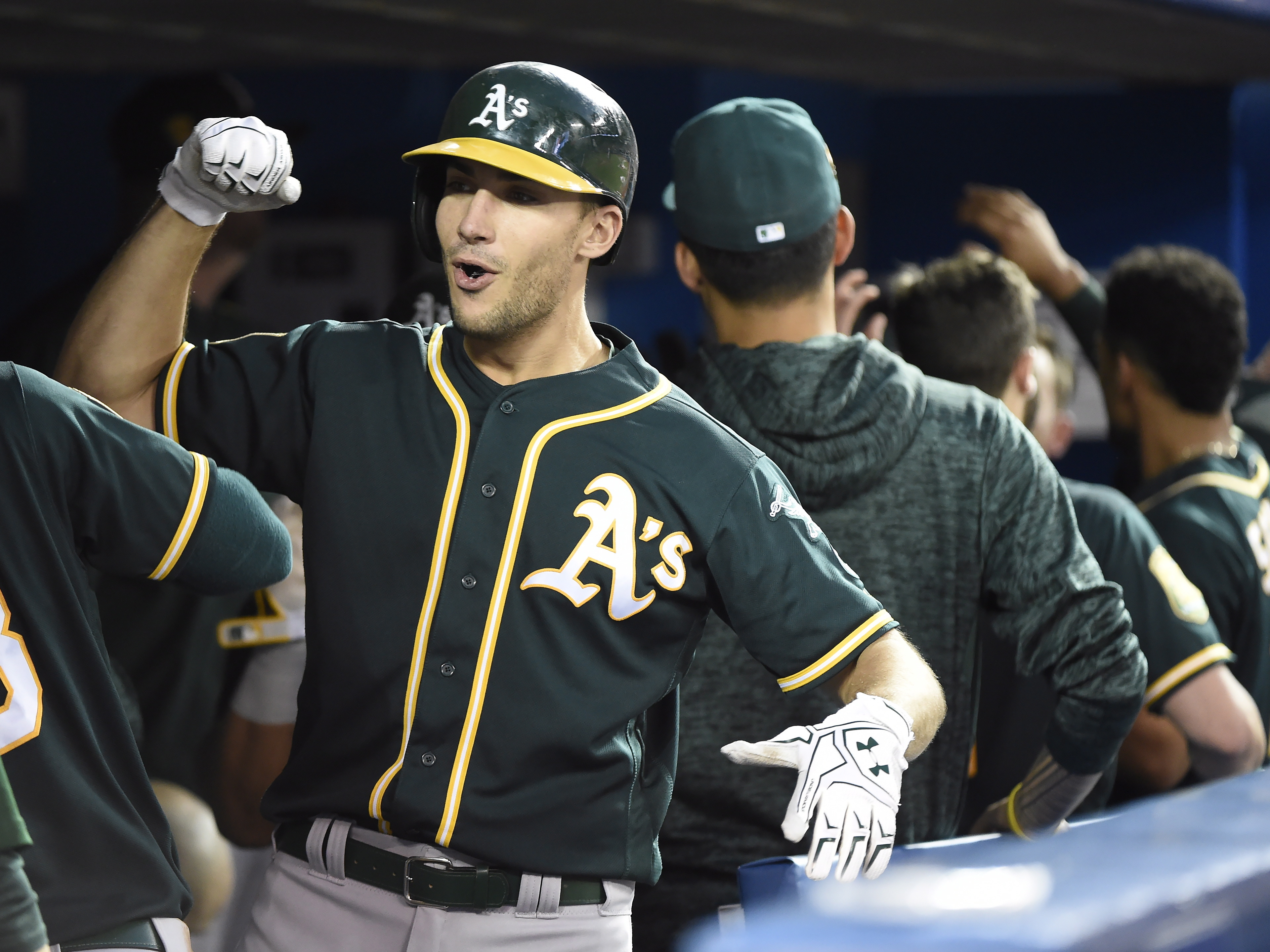 Athletics hit 3 HRs, beat Blue Jays 10-5