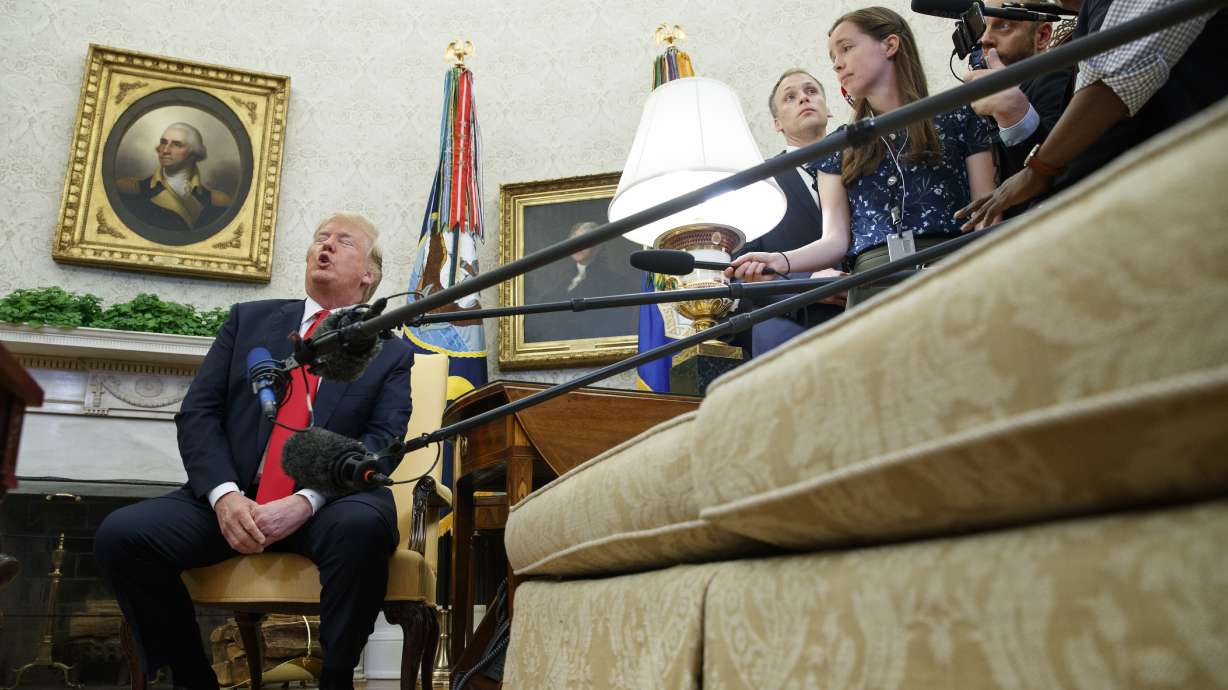 'Animals'? Trump says he'll keep using term for gang members