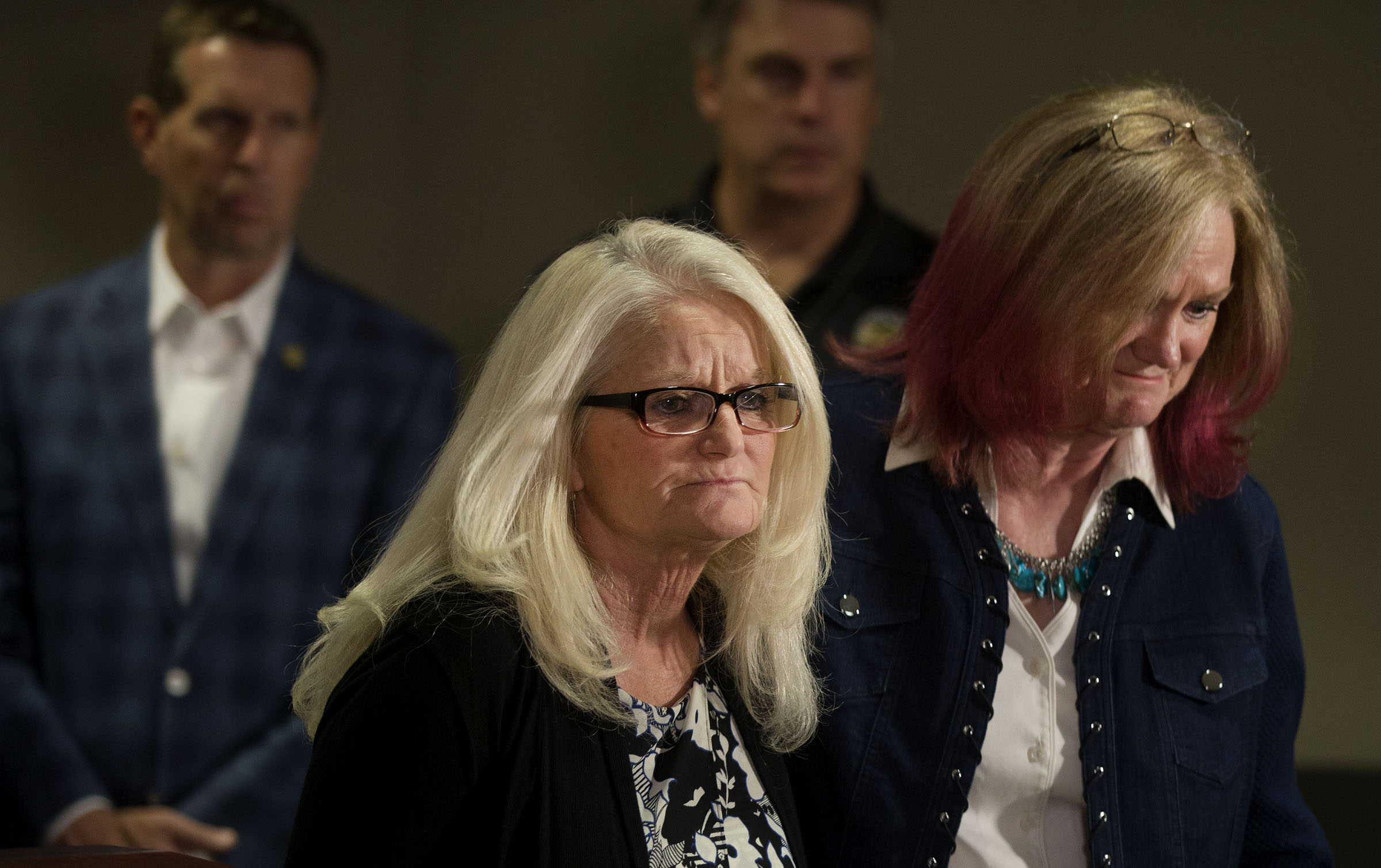 Cindy Greer, left, and her sister Karin Johnston leave the podium after talking about their father, Jack Richardson, who was found murdered in 1979 during a press conference at the UPD Headquarters in West Valley on Friday, May 18, 2018. (Photo: Laura Seitz, KSL)