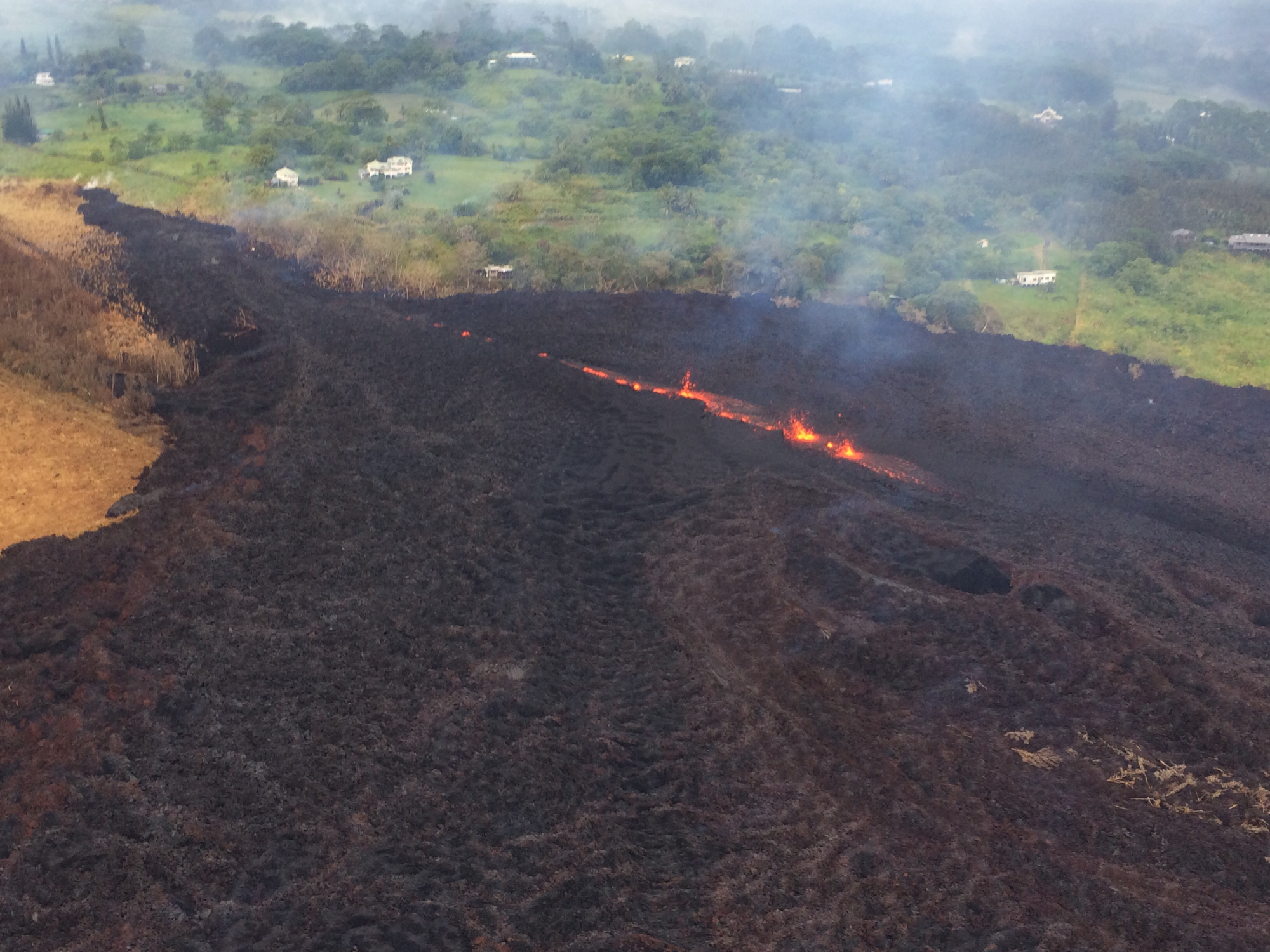 The Latest: Hawaii authorities warn of fast-moving lava
