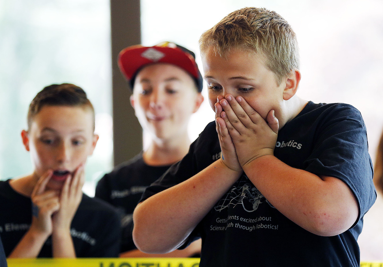 Ollie Eames, of Buffalo Point Elementary School, watches his robot perform during USU Physics Day at Lagoon in Farmington on Friday, May 18, 2018. (Photo: Ravell Call, KSL)