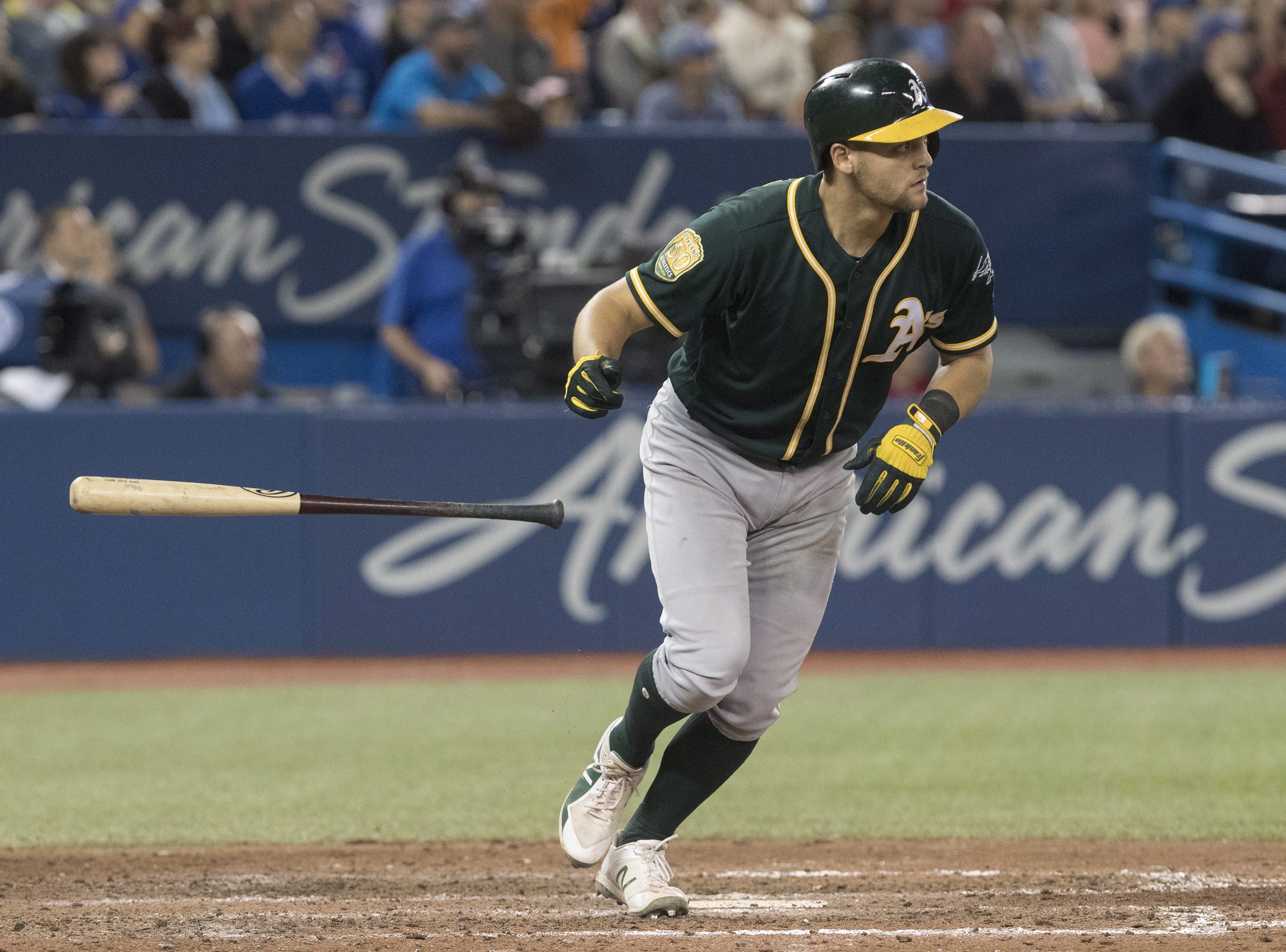 Pinder hits grand slam, A's get 5 in 8th, beat Blue Jays 5-4