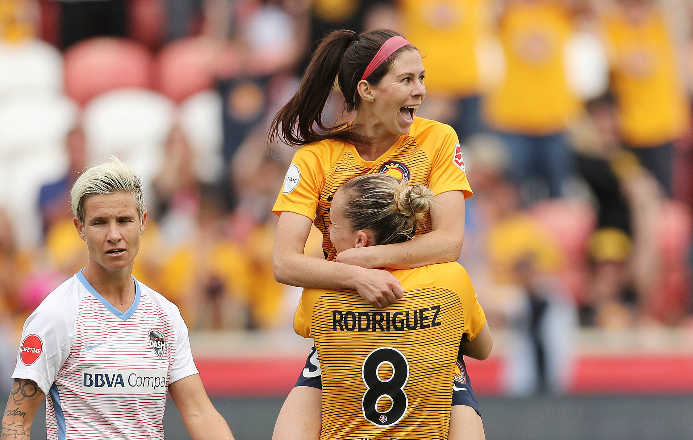 Utah Royals FC midfielder Erika Tymrak (15) celebrates her goal with Houston Dash midfielder Claire Falknor (8) in Sandy on Saturday, May 19, 2018. (Photo: Jeffrey D. Allred, Deseret News)