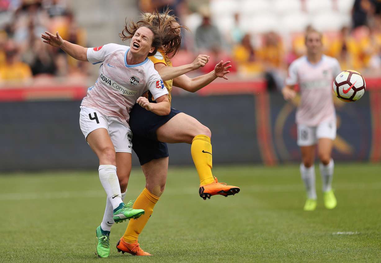 Houston Dash defender Allison Wetherington (4) and Utah Royals FC forward Amy Rodriguez (8) collide in Sandy on Saturday, May 19, 2018. Utah won 1-0. (Photo: Jeffrey D. Allred, Deseret News)