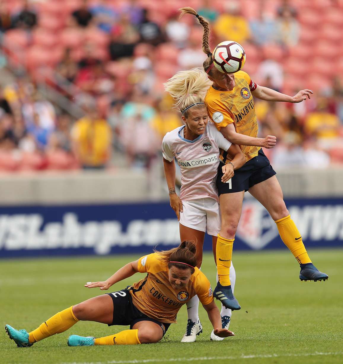 Utah Royals FC defender Becky Sauerbrunn (4) and Houston Dash defender Rachel Daly (3) head the ball in Sandy on Saturday, May 19, 2018. (Photo: Jeffrey D. Allred, Deseret News)