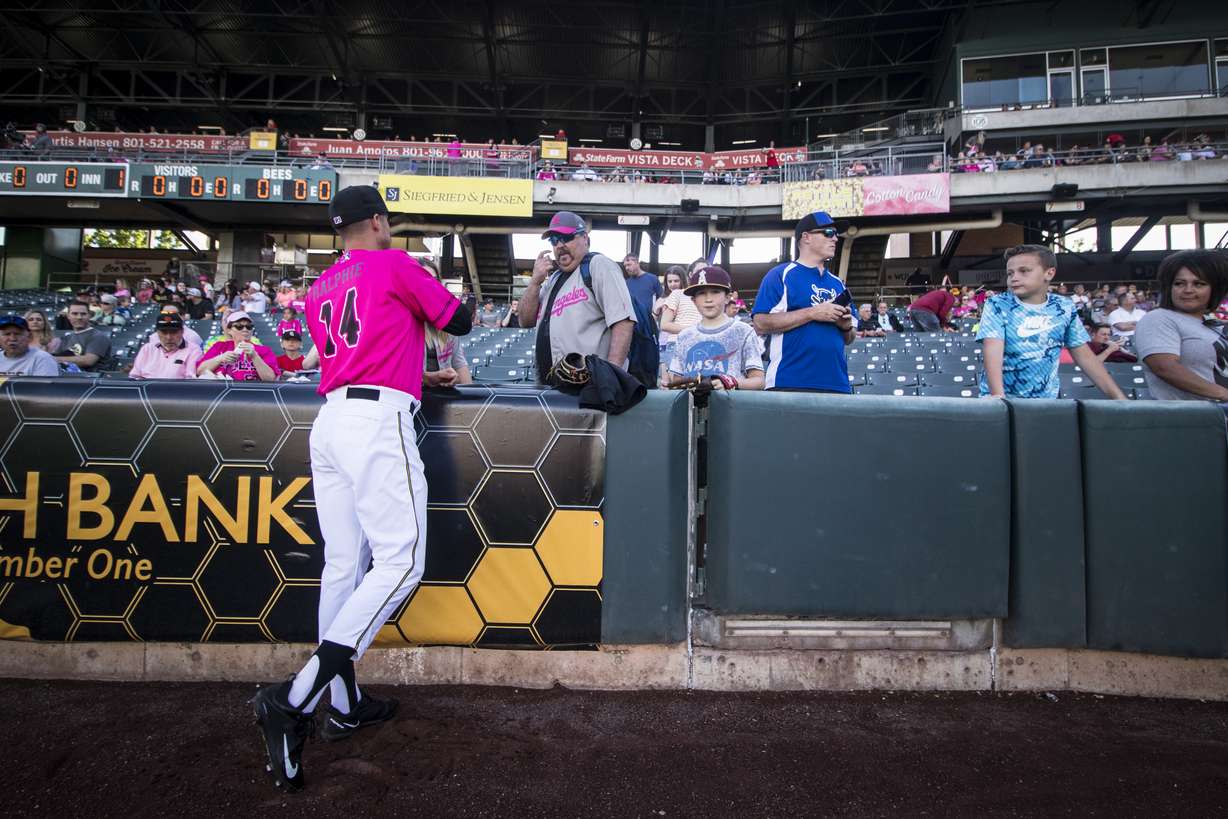 Salt Lake Bees pitcher Ralston Cash speaks with fans prior the Bees' game against Sacramento Saturday night at Smith's Ballpark. Cash purchased his jersey and put his grandfather/father's name "Ralphie" on the nameplate. (Photo: Carter Williams, KSL.com)