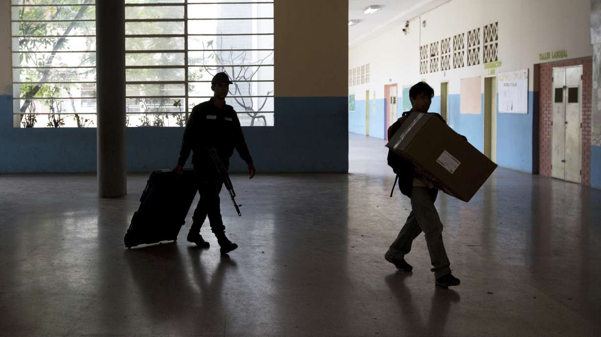 The Latest: Maduro celebrates re-election, urges dialogue