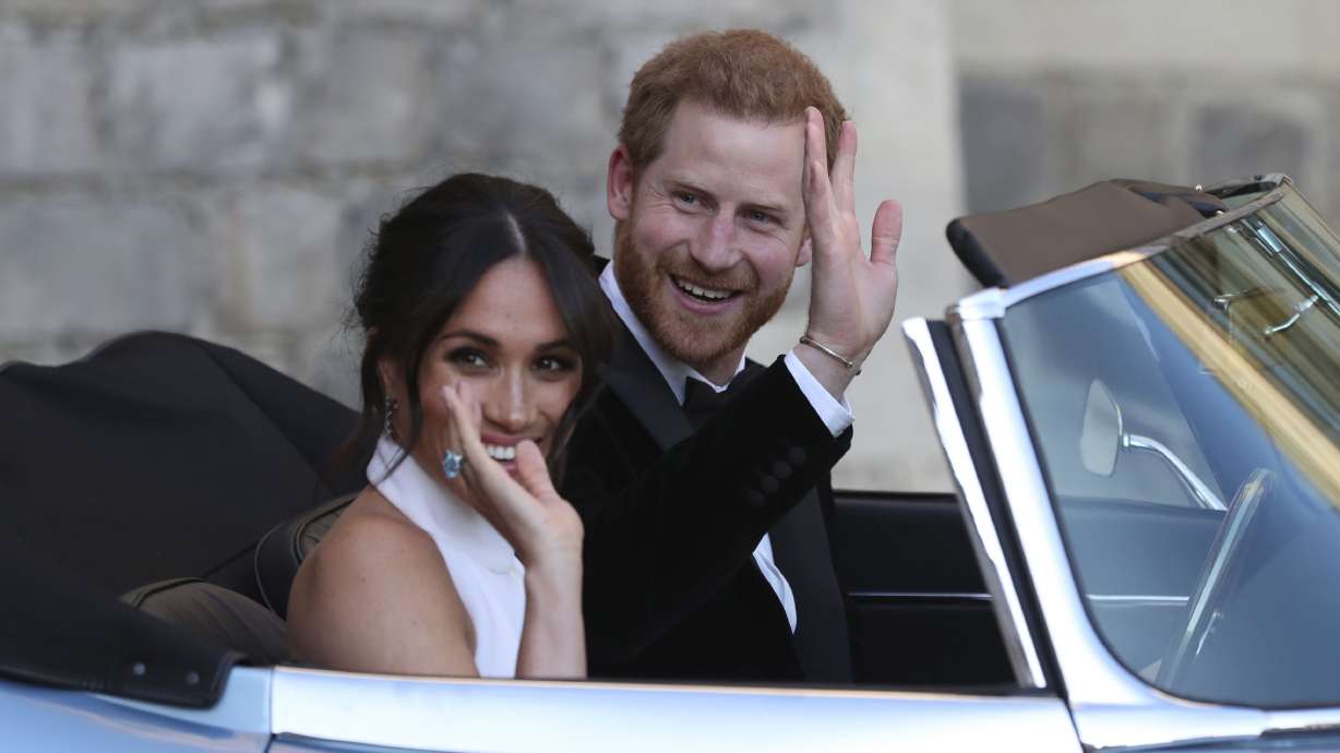 Britain basks in royal wedding afterglow; grave gets bouquet