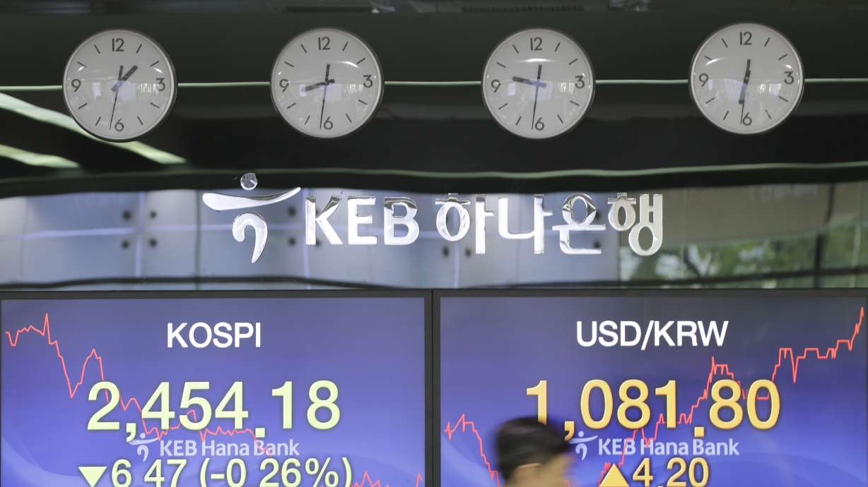 Asian markets higher as US, China put trade war on hold