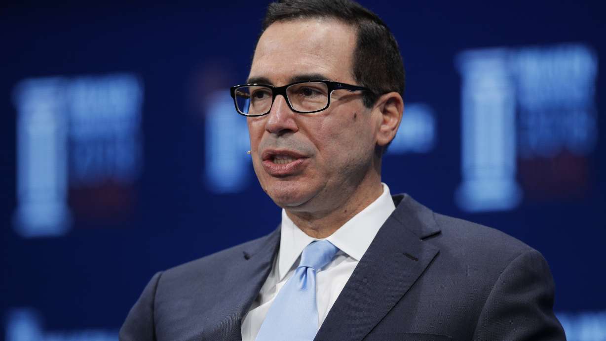The Latest: US-China inject note of caution post-trade truce