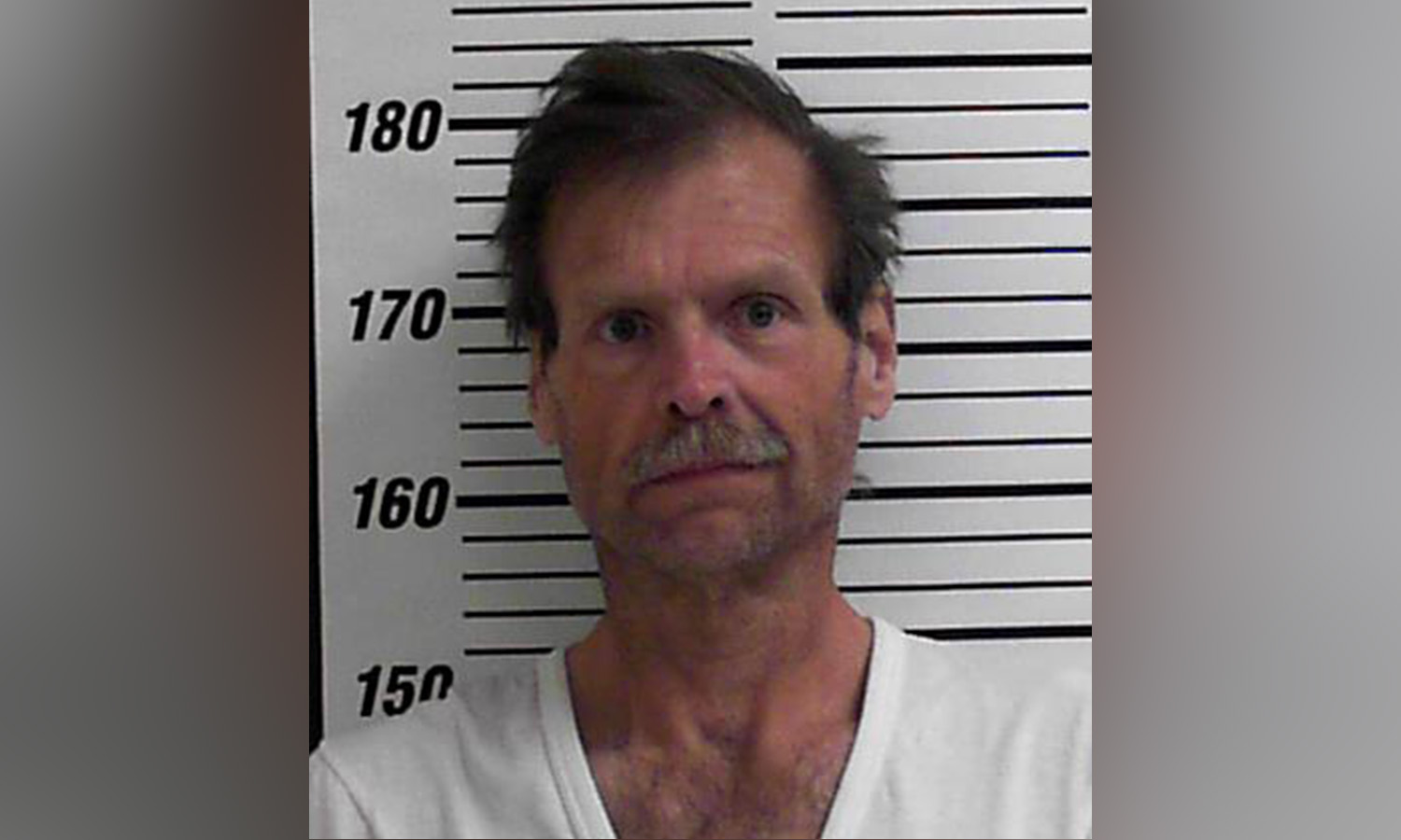 Man arrested in connection with low-income housing apartment fire