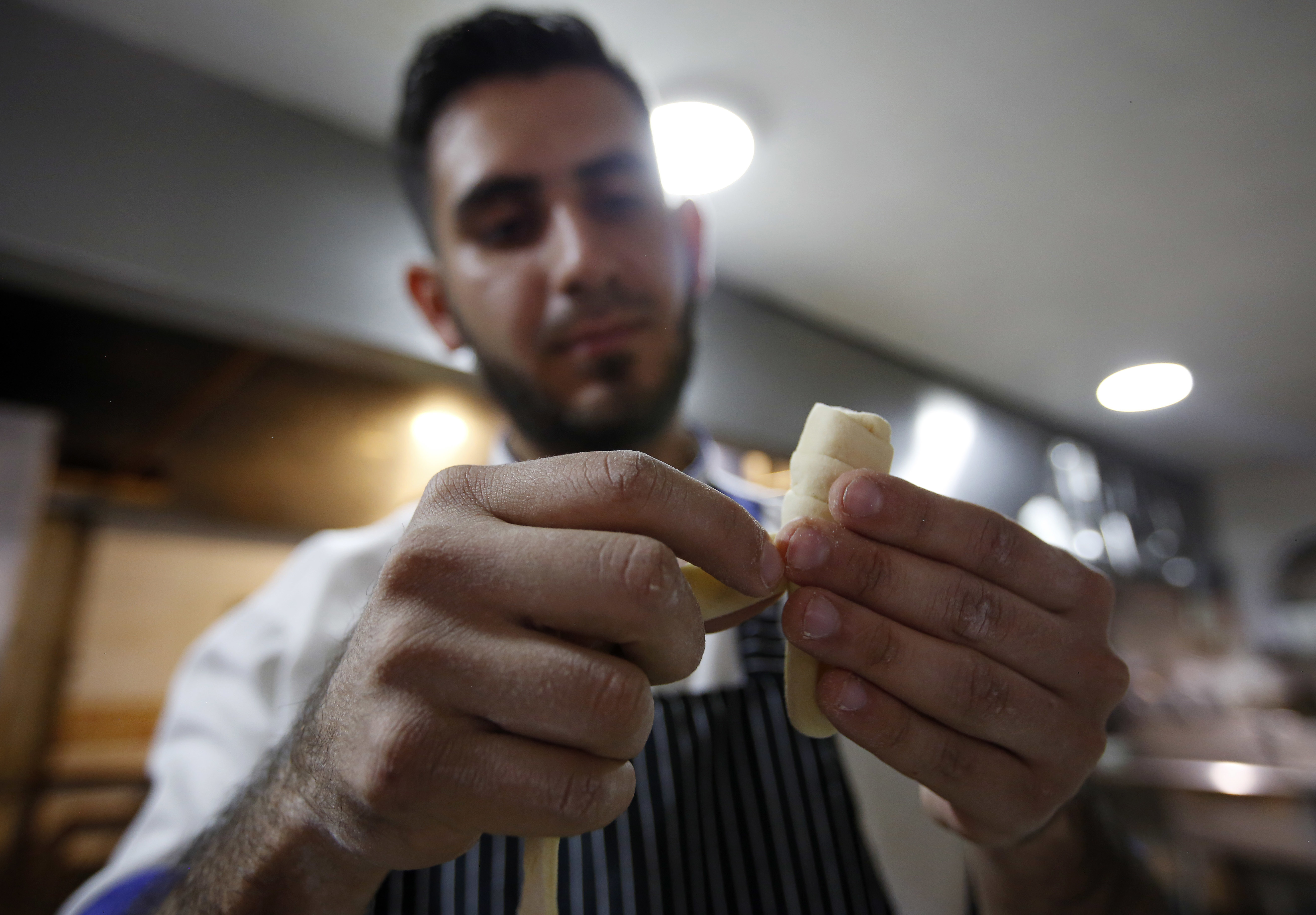 Migrant remittances a big business in cash-starved Venezuela