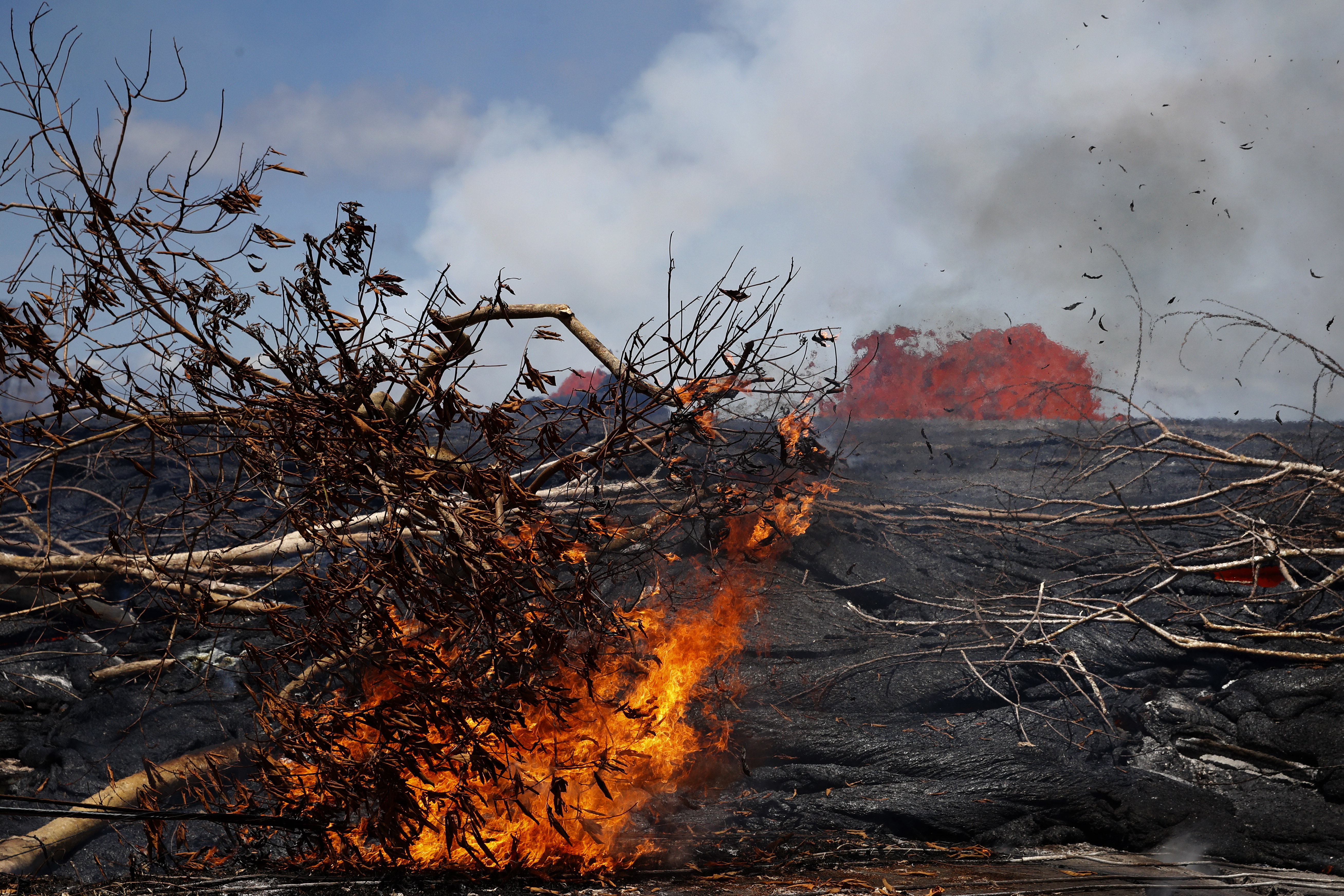 Hawaii volcano generates blue flames from burning methane
