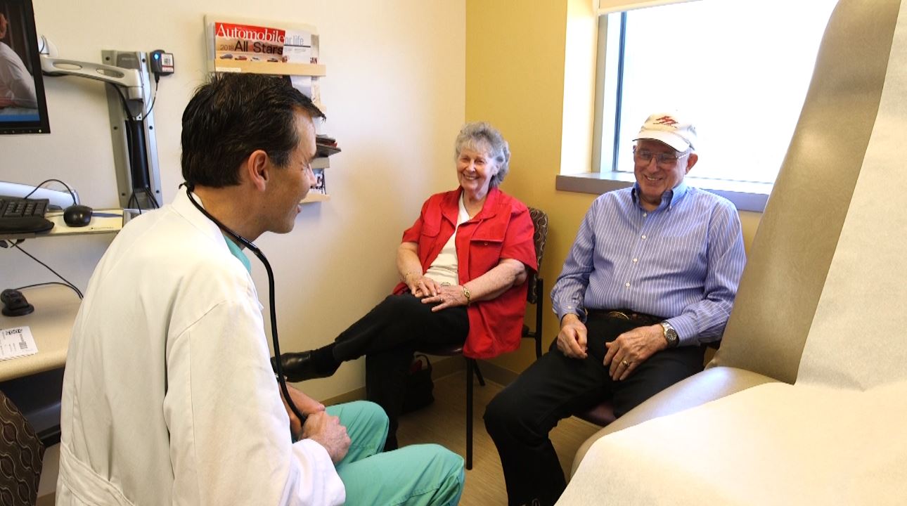 Dr. John Day meets with one of his patients who drives more than 900 miles to see him each year. (Photo: KSL TV)