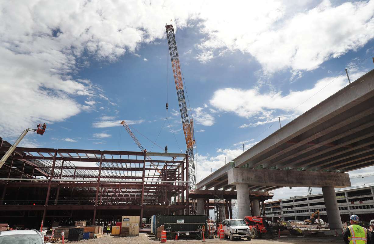 The last beam for the new terminal at the Salt Lake City International Airport is lowered into place in Salt Lake City on Wednesday, May 23, 2018. (Photo: Jeffrey D. Allred, KSL)