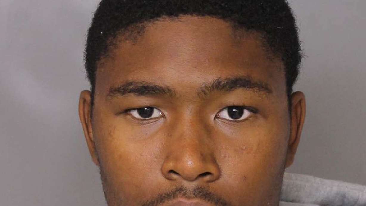 Officials trade blame after teen arrested in officer's death
