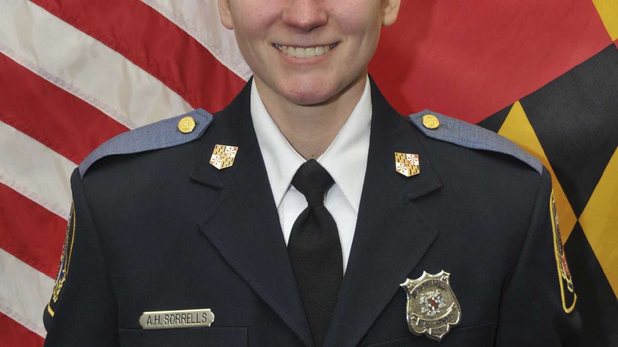 Hundreds of cars join procession for slain Maryland officer