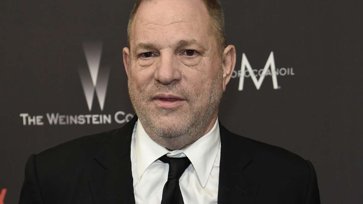 The Latest: Weinstein takes books on theater, film to arrest