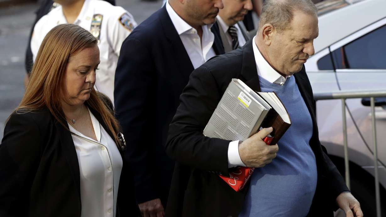 Weinstein turns himself in holding 2 entertainment bios