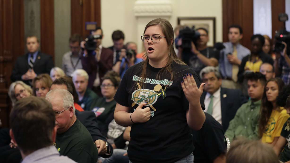 The Latest: Mourners told student brave 'beyond his years'