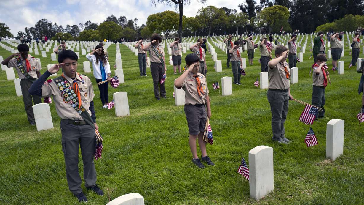 Scouts honor veterans for Memorial Day with gravesite flags
