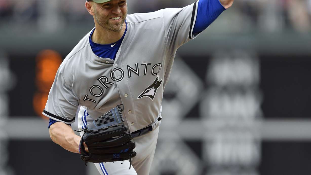 J.A. Happ bests former team, Blue Jays top Phillies 5-3