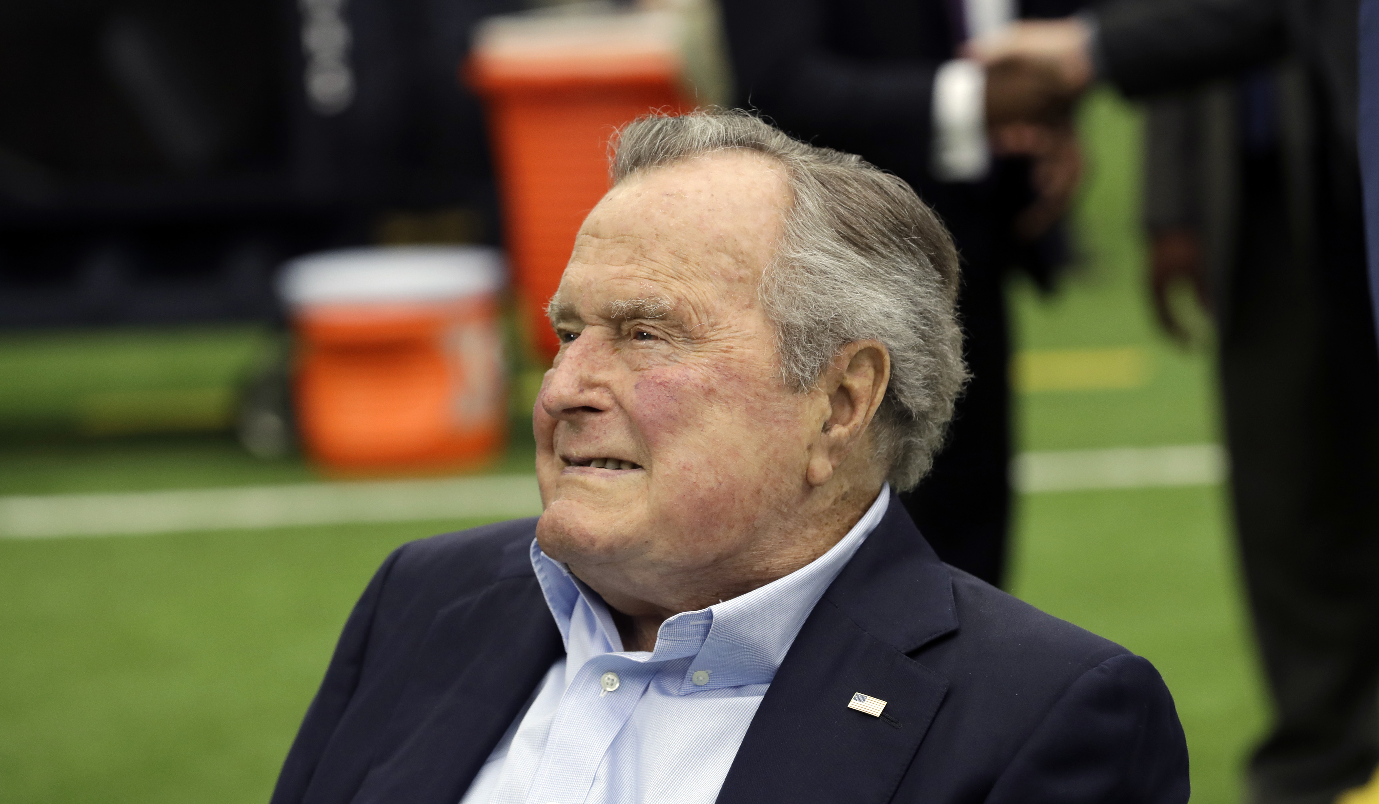 The Latest: George HW Bush says he regrets missing parade