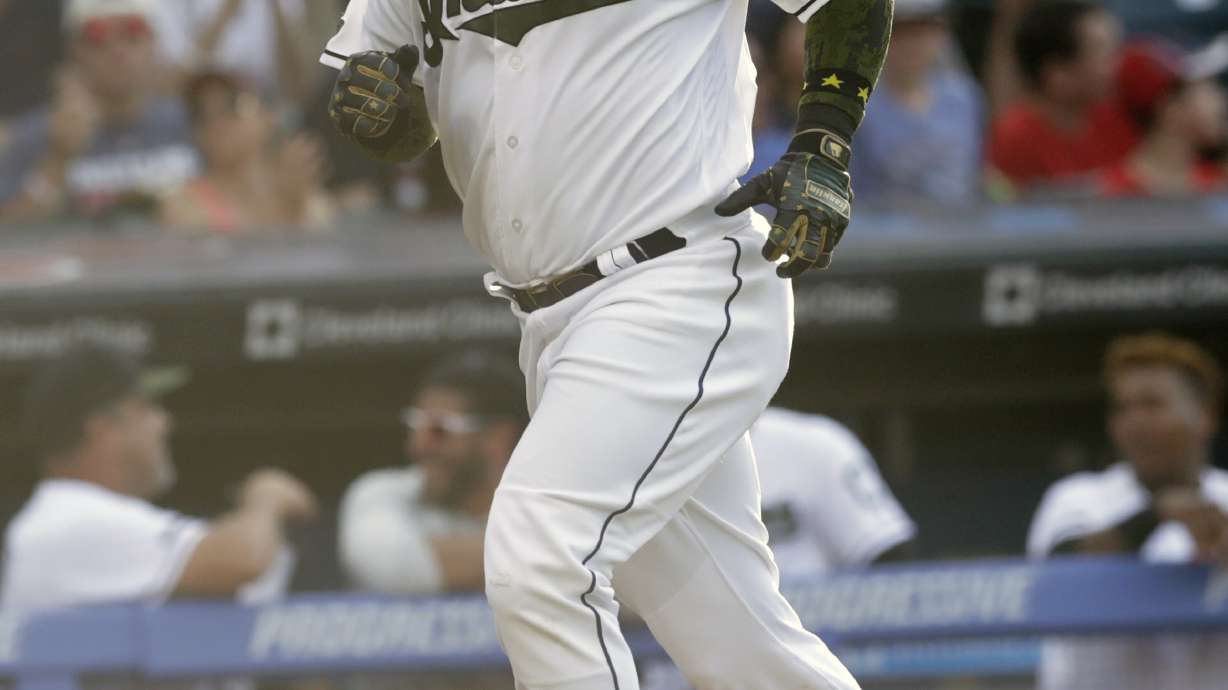 Encarnacion, Chicago's poor defense boost Indians to 9-6 win