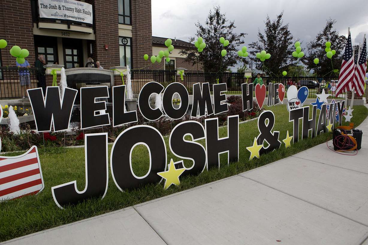 A sign greeting Josh Holt and his wife Thamy outside the Old Dome Meeting Hall at Riverton City Park in Riverton, Utah, Monday, May 28, 2018. (Photo: James Wooldridge, KSL)