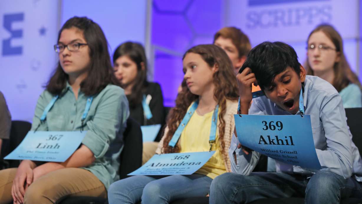 Linh Le, 14, from St. Clairsville, Ohio, left, Almudena Soler, 10, from Humacao, Puerto Rico and Akhil Madala, 11, from Dublin, Ohio, wait their turn during the 2nd Round of the Scripps National Spelling Bee, Tuesday, May 29, 2018, in Oxon Hill, Md. Photo: AP Photo