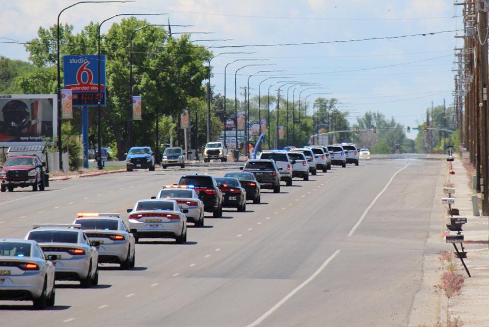 A procession of law enforcement vehicles accompanies K-9 Aries' remains to the home of his handler, Uintah County deputy sheriff Kyle Fuller on Wednesday, May 30, 2018. (Photo: Uintah County Sheriff's Office)
