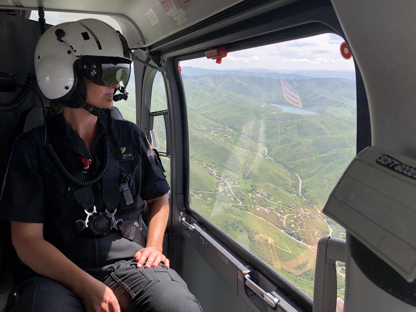 Sheila Fuller, a flight therapist on the University Hospital's AirMed team, rides one of the team's medical helicopters during AirMed's 40th anniversary celebration on Thursday, May 31, 2018. (Photo: McKenna Park, KSL)