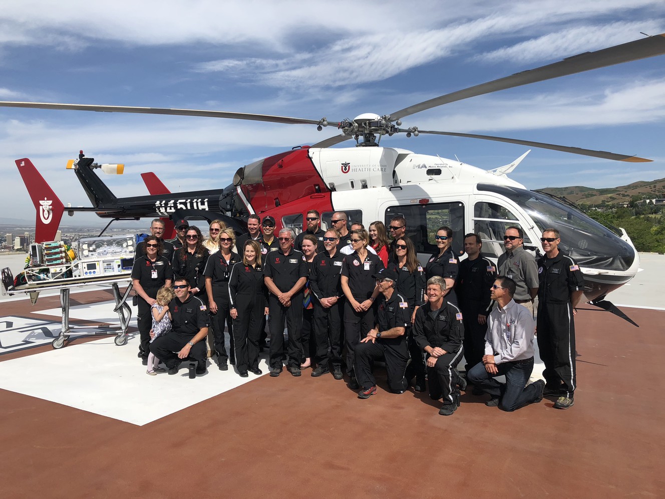 The University Hospital AirMed team celebrates 40 years of saving lives Thursday, May 31, 2018, on the hospital's helicopter pad in Salt Lake City. (Photo: McKenna Park, KSL)