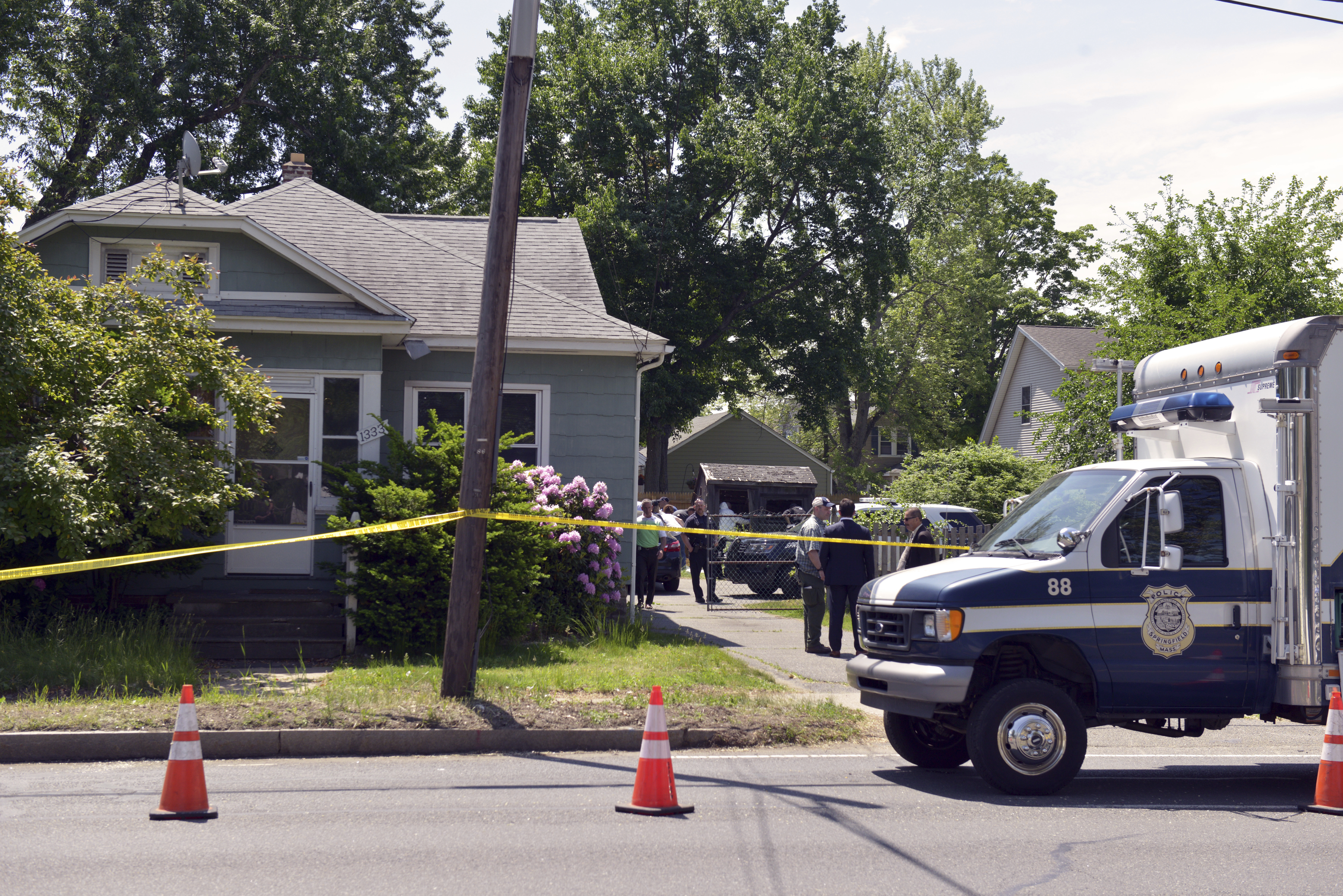 Police back at kidnapping suspect's home where bodies found