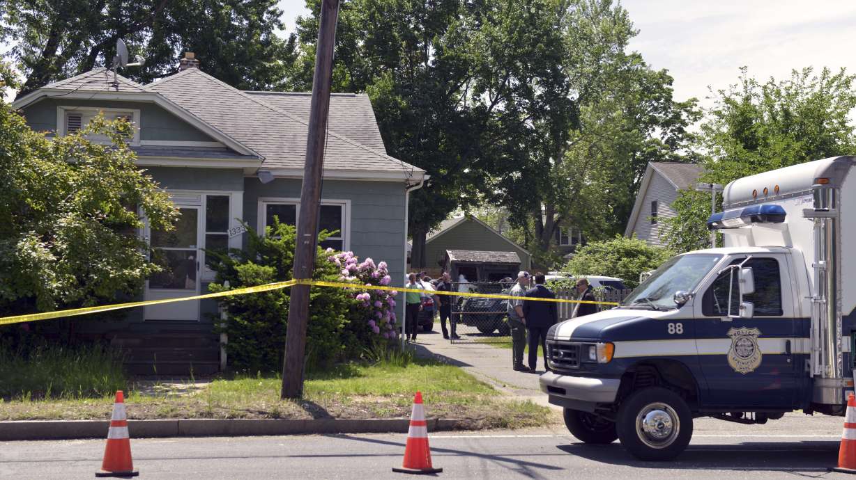 Police back at kidnapping suspect's home where bodies found