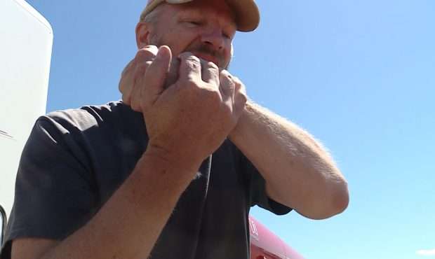 Darren Phillips shows off the choke hold he used Thursday. Photo: Mike DeBernardo, KSL TV