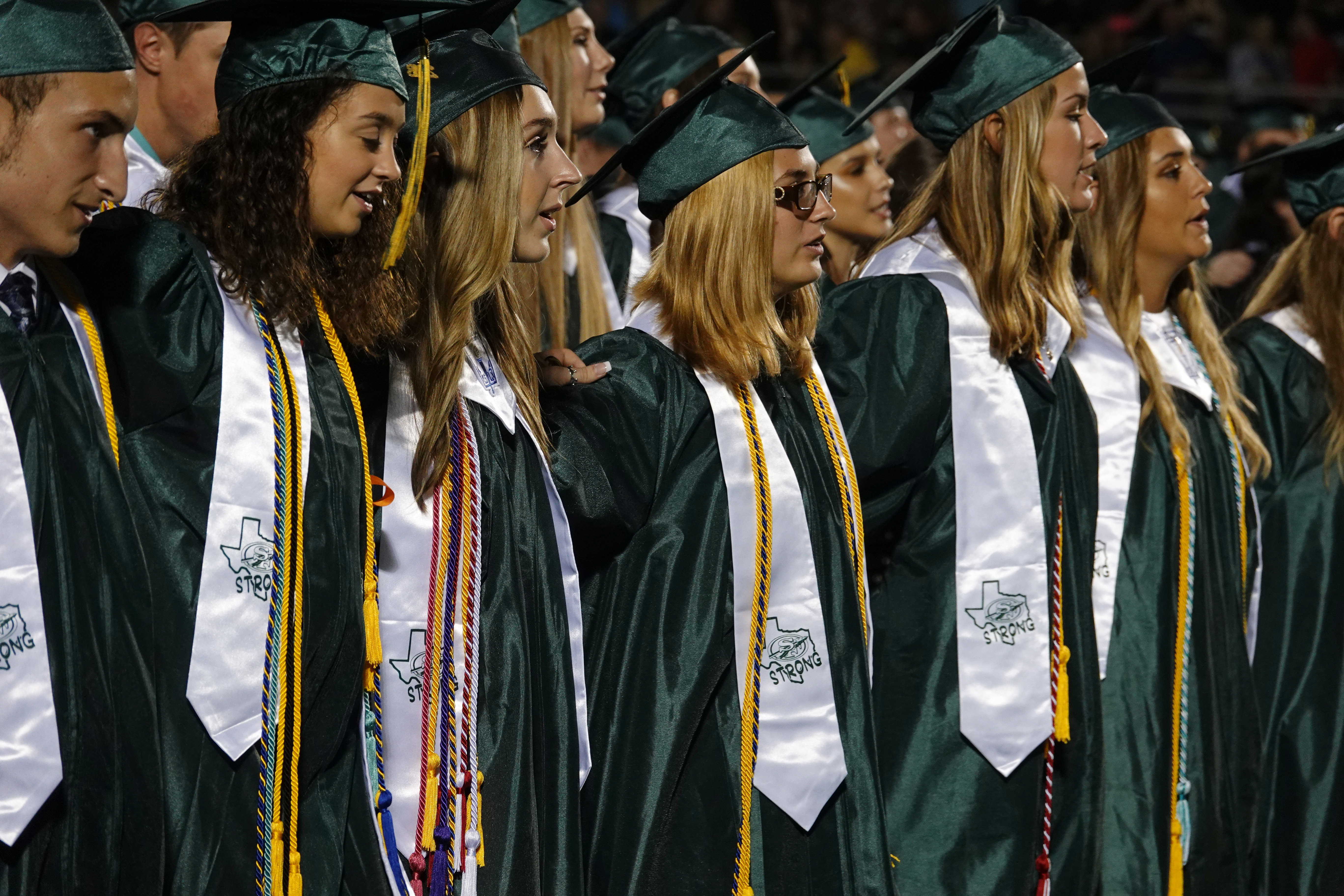 Students graduate from Texas school where shooting killed 10
