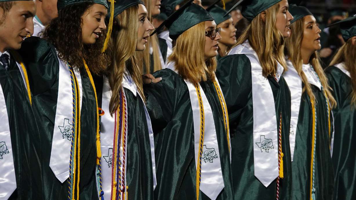 Students graduate from Texas school where shooting killed 10