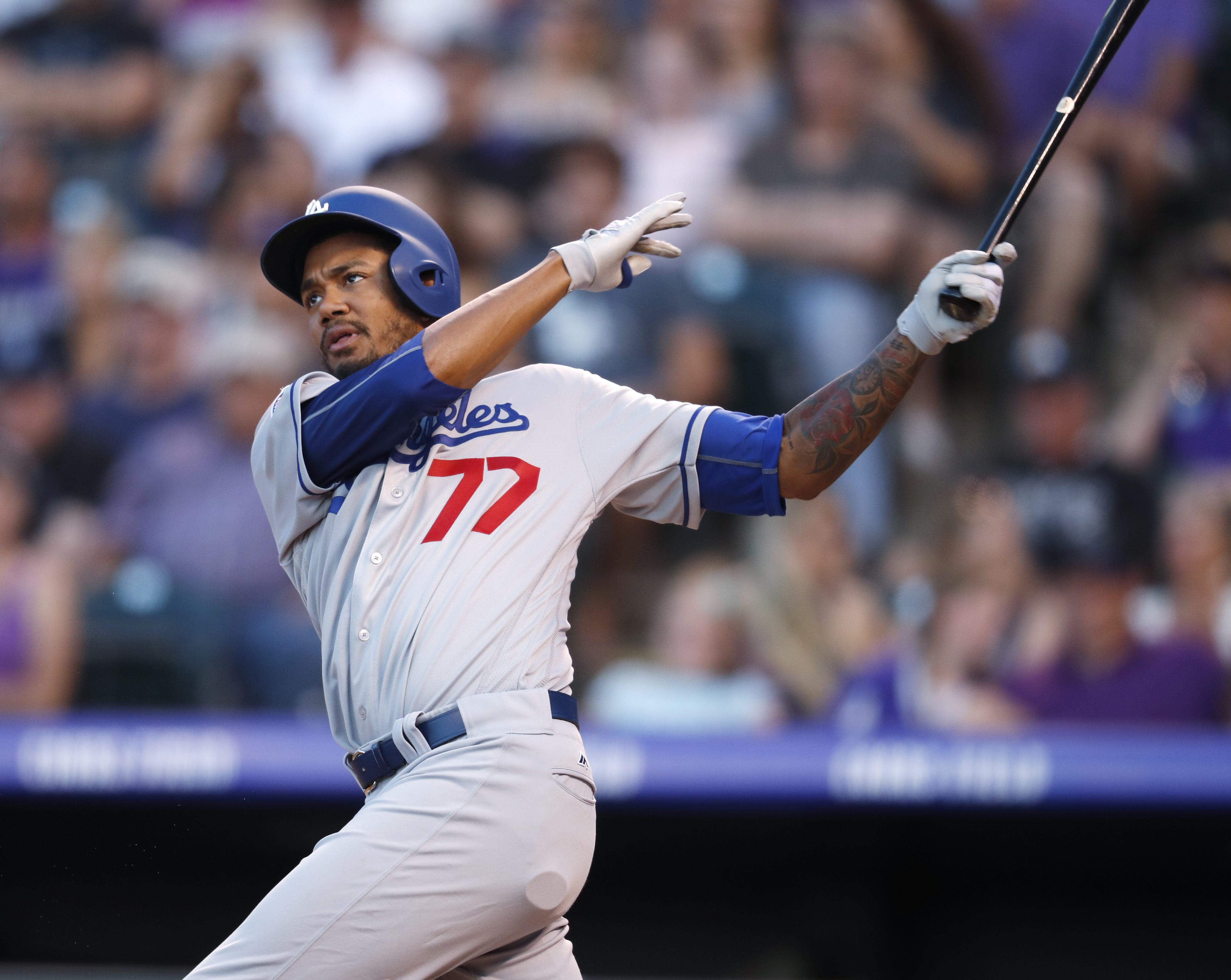 Santana picks up win in debut, Dodgers beat Rockies 11-8