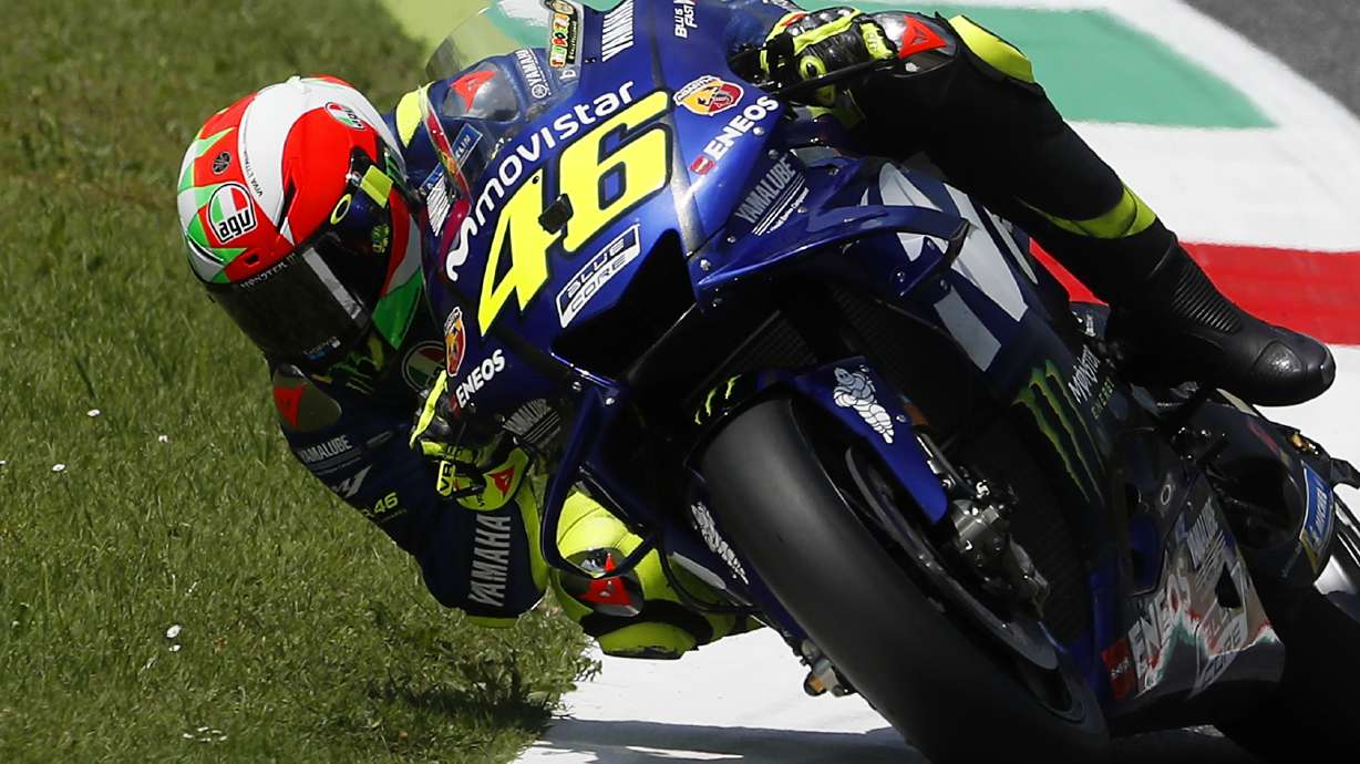 Rossi takes 1st pole in nearly 2 years at Italian GP