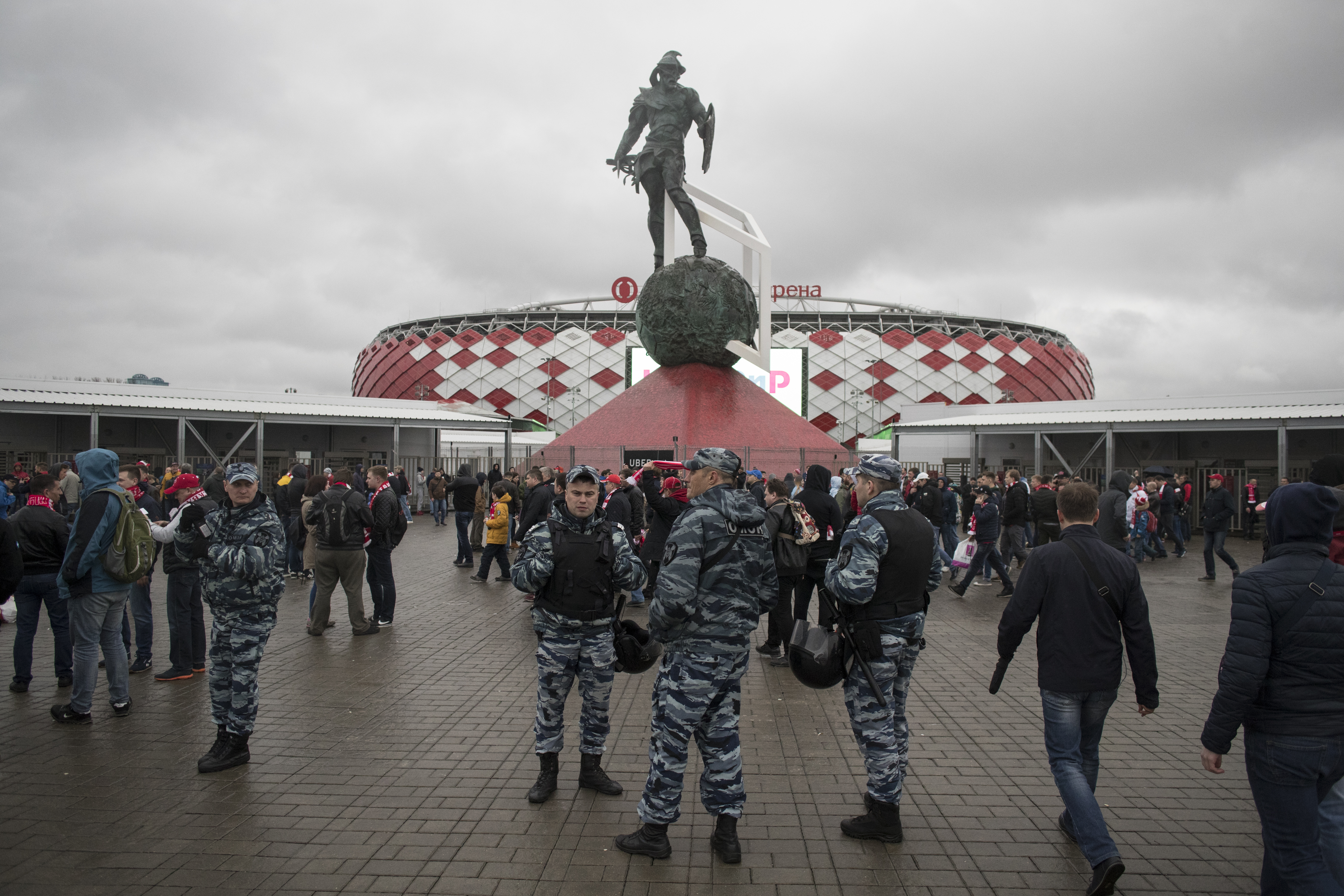 In this photo taken on Wednesday, April 18, 2018, police officers guard before a Russian Premier League Championship soccer match between Spartak Moscow and Tosno, with the World Cup Spartak stadium in the background, in Moscow, Russia. (Photo: Pavel Golovkin, AP Photo, File)