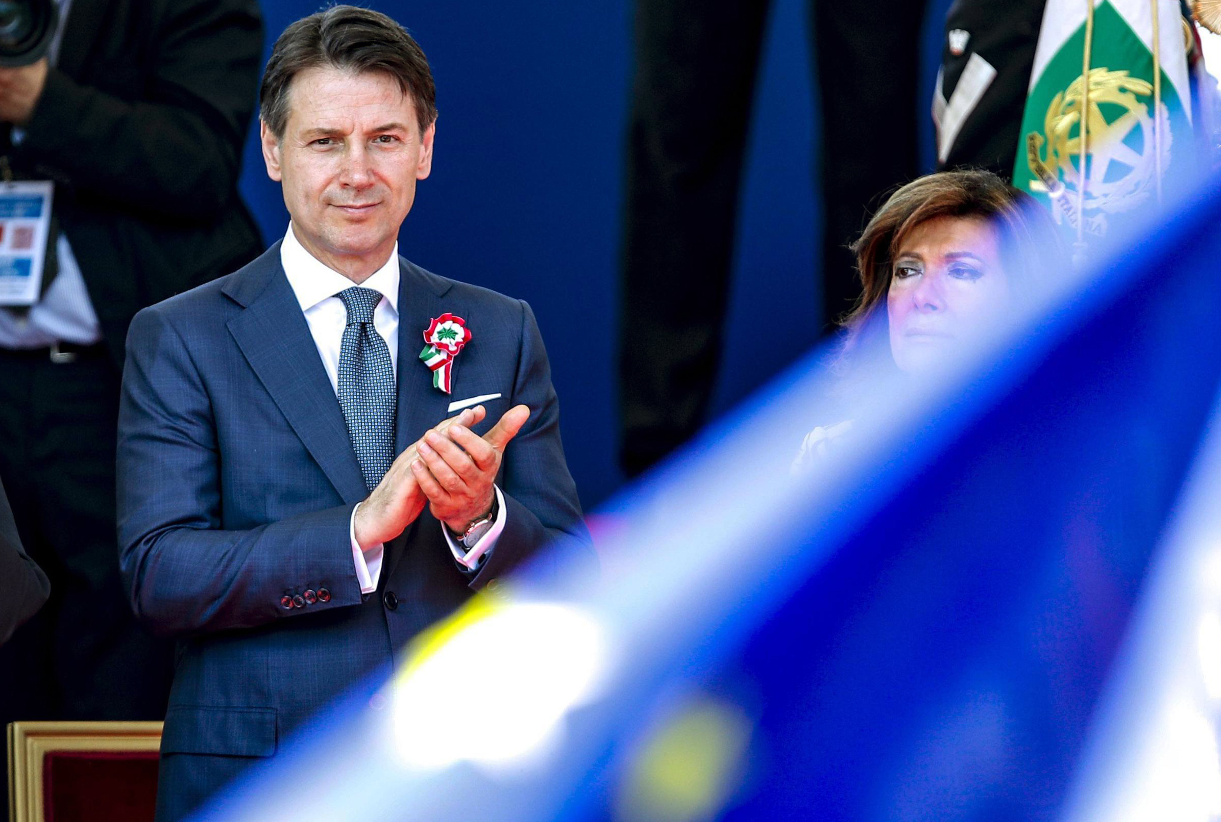 The Latest: Italy's populist govt wins 1st confidence vote