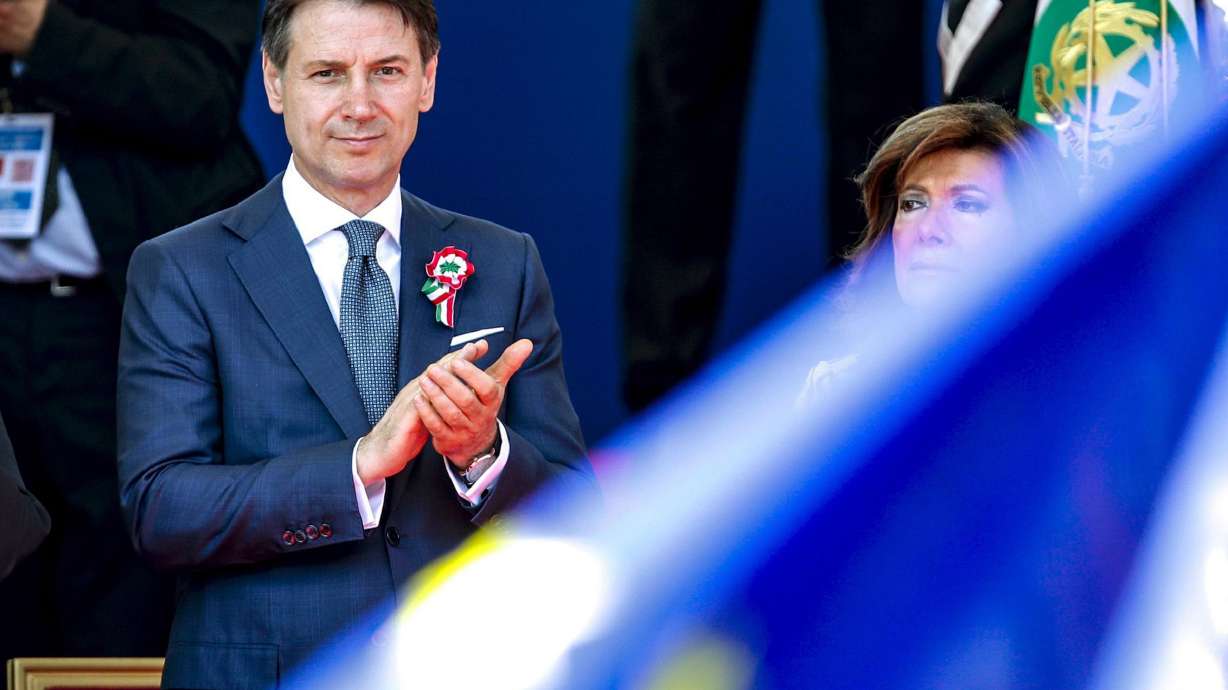 The Latest: Italy's populist govt wins 1st confidence vote
