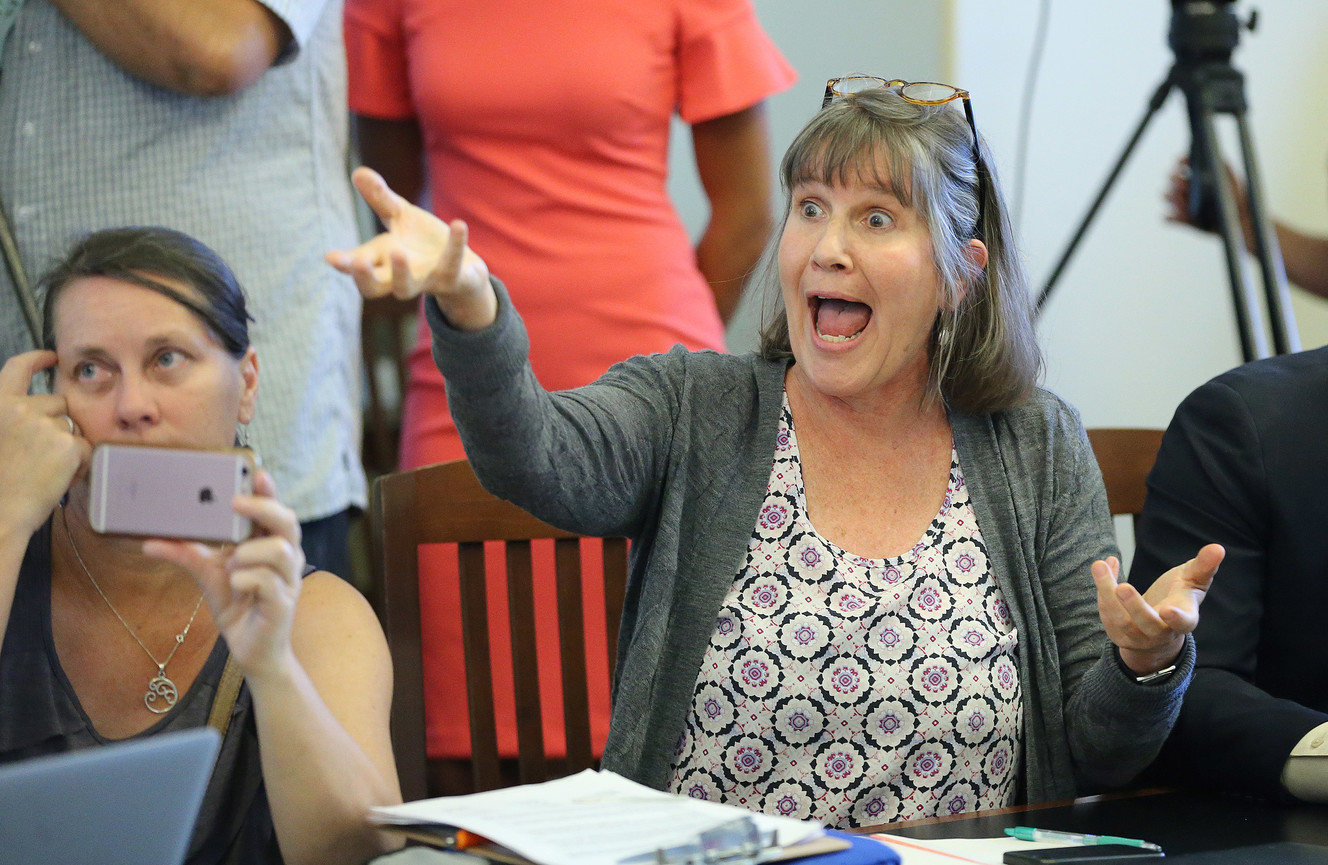 Deeda Seed complains to state Sen. Jim Dabakis, D-Salt Lake City, and Utah House Speaker Greg Hughes, R-Draper, during a press conference at the Capitol in Salt Lake City on Tuesday, June 5, 2018. (Photo: Jeffrey D. Allred, KSL)