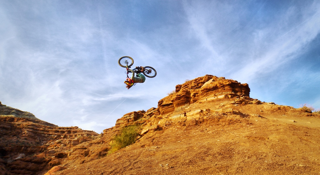 Kaylee Gibb midway through her outdoor backflip on a ridge in Virgin. April 2018, Virgin, Utah. (Photo: Ryan Gibb, St. George News)