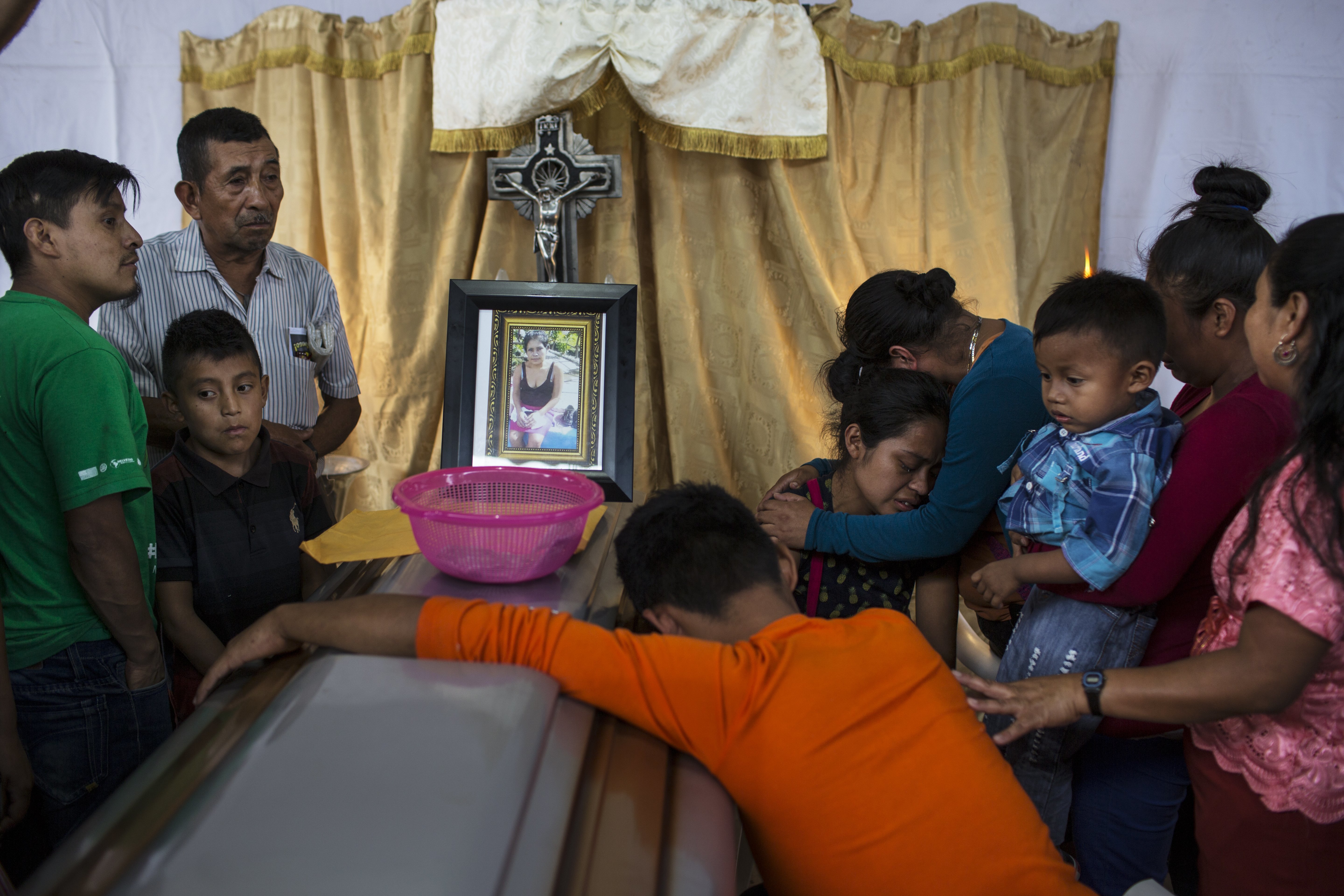 Grim task as forensic experts ID Guatemala volcano victims