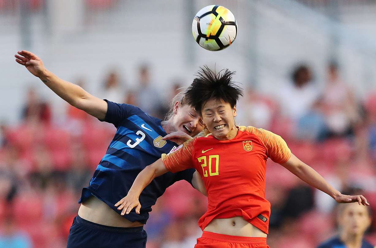 U.S. Women's National Team's Julie Ertz and China's Zhang Rui head the ball in Sandy on Thursday, June 7, 2018. USA won 1-0. (Photo: Jeffrey D. Allred, Deseret News)
