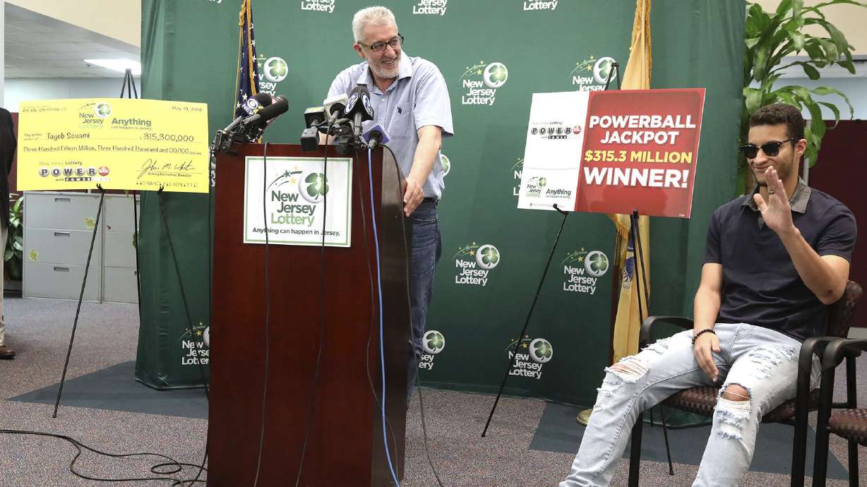 New Jersey man claims $315 million Powerball jackpot